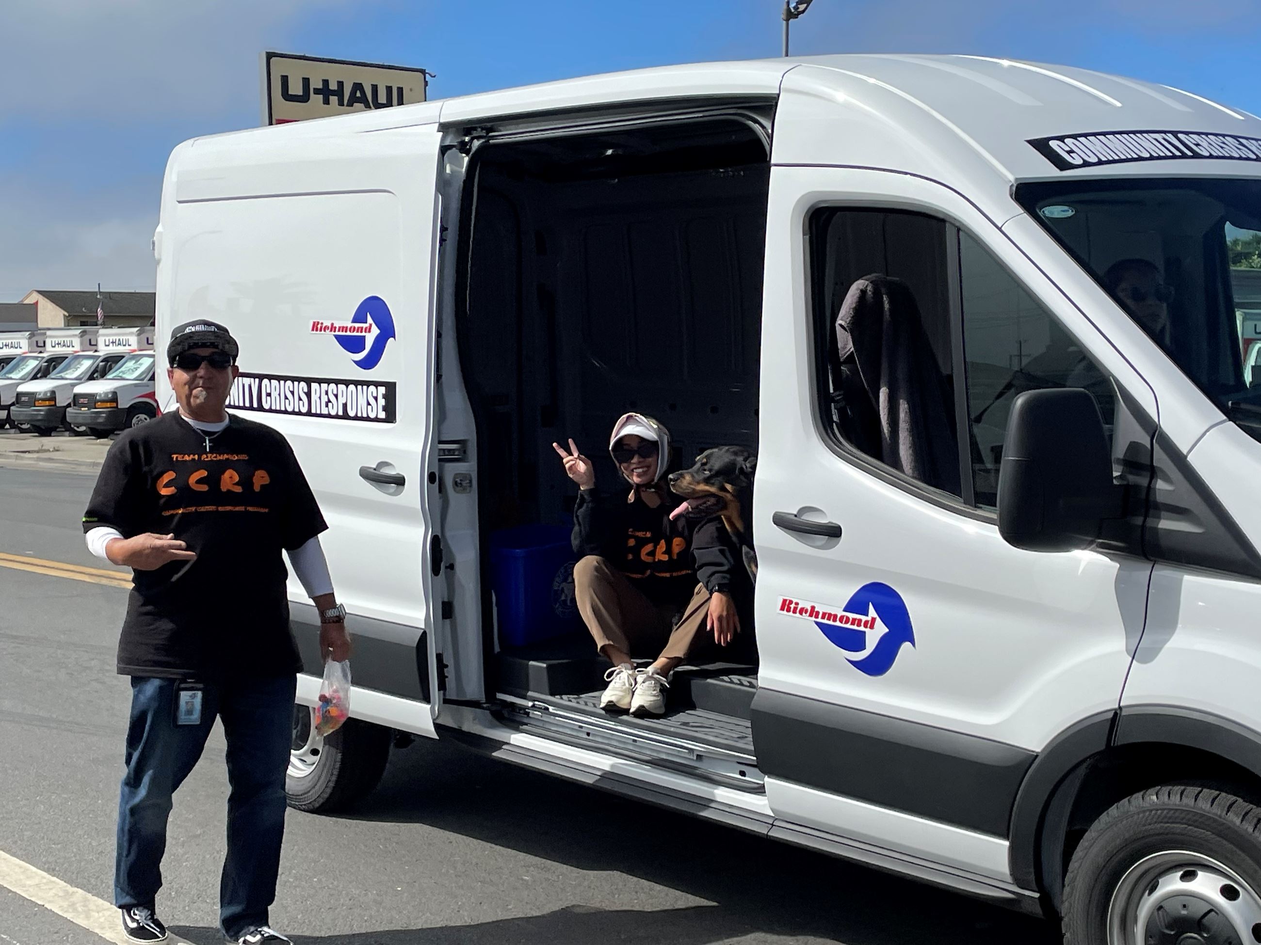 CCRP Team standing in front of van at Cinco De Mayo Parade